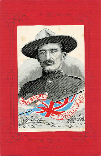 same postcard of General Baden Powell, with title woven on ribbon, but with red coloured card