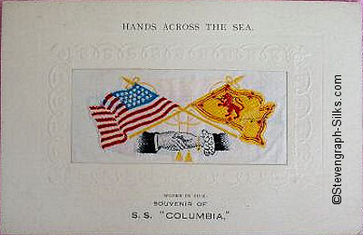 woven image of USA and Scottish flags, with Hands Across the Sea printed above silk, and ships name printed below silk
