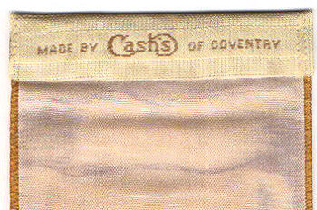 woven name of Cash's on the reverse top turnover of this bookmark