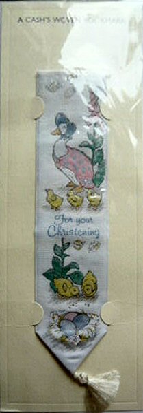 J & J Cash woven bookmark, with words, FOR YOUR CHRISTENING, and image of Jemima Puddleduck