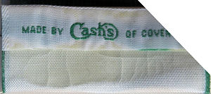 CASH'S name and logo woven on the reverse top turnover
