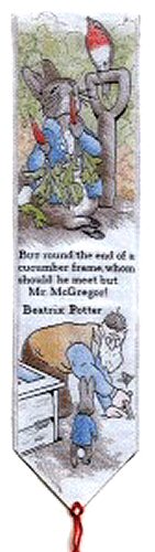 Cash's woven bookmark of Peter Rabbit, and words: But round the end of a cucumber frame
