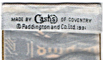 Cash's woven name and copyright notice on the reverse top turnover of this bookmark