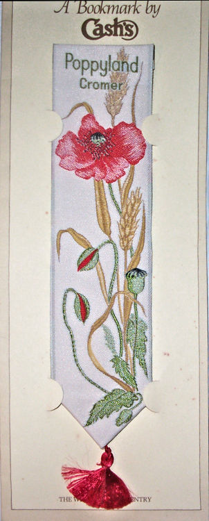 J & J Cash woven bookmark, with image of poppies and title words