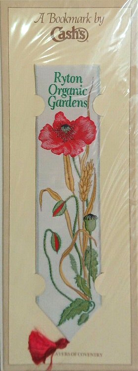 Cash's woven bookmark with title words and image of a poppy flower