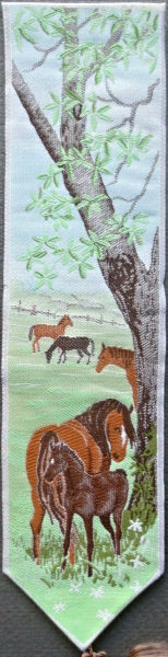 J & J Cash woven bookmark, with no words, but images of ponies