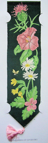 J & J Cash woven bookmark, with no words, but images of various flowers