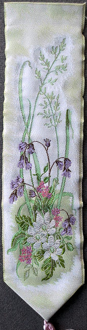 J & J Cash woven bookmark, with no words, but images of Wood Anemone and other flowers