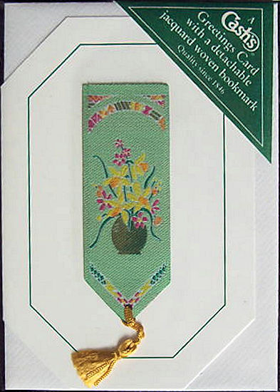 Cash's greeting card, with an attached woven green bookmark without any words
