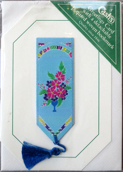 Cash's greeting card, with an attached woven blue bookmark without any words