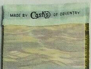J & J Cash logo woven on reverse top turnover of this bookmark