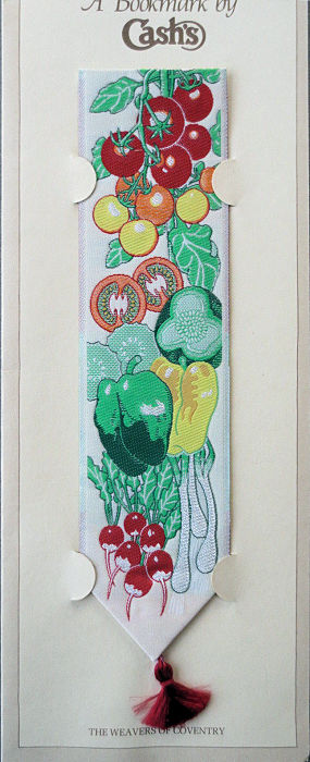 J & J Cash woven bookmark, with no words, but images of various vegetables