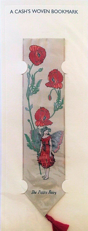 J & J Cash woven bookmark, with title words, and image of red poppies and a fairy