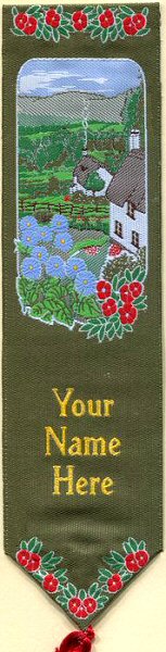 Cash's woven bookmark with title words, image of a country scene and red flowers at various places