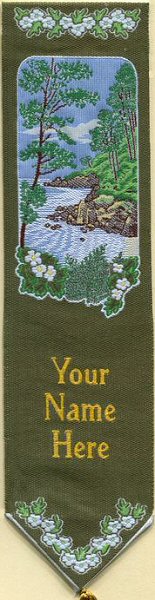 Cash's woven bookmark with title words, image of a coastal scene and white flowers at various places