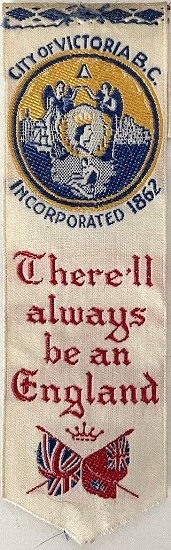 Cash's woven bookmark with woven words round a City emblem, and words of " There'll always be an England "