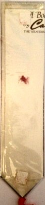 view of the stiff card glued to the rear of this bookmark, showing the CASH'S printed name