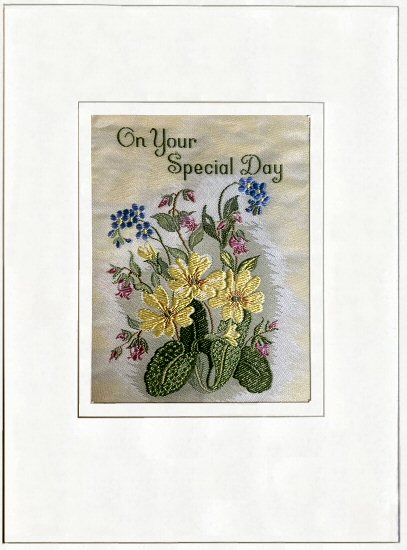 J & J Cash's greetings card with words woven on tapestry, ON YOUR SPECIAL DAY, and image of various flowers