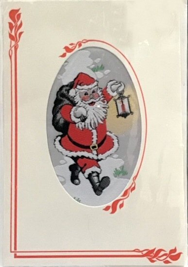 J & J Cash woven Christmas card, with no words, with image of Father Christmas carrying a candle lantern