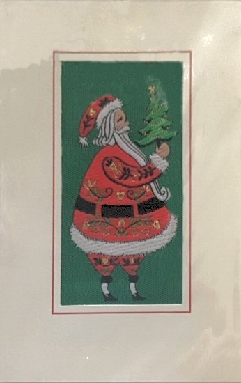 J & J Cash woven Christmas card, with no words, with image of stylised Father Christmas holding a miniature Christmas tree