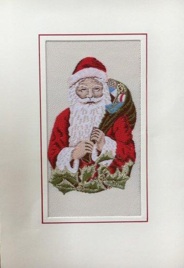 J & J Cash woven Christmas card, with no words, with image of full face Father Christmas