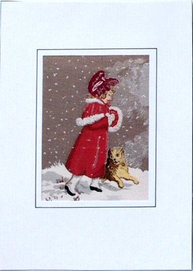 J & J Cash woven Christmas card, with no words, with image of a young woman with hands inside a muff and little dog