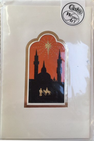 J & J Cash woven Christmas card, with no words, with image of Mary on a donkey, Joseph and a star