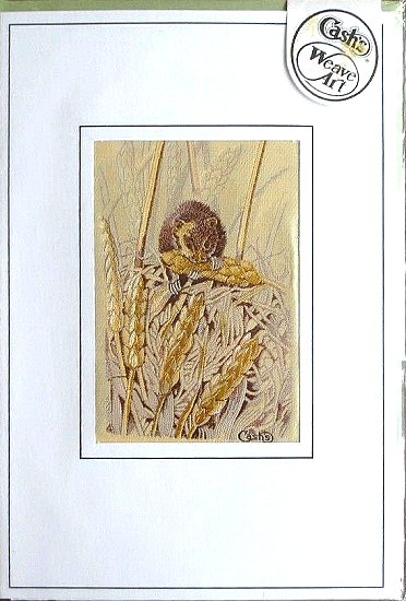 J & J Cash woven card, with no words, but picture of an Harvest mouse with an ear of corn