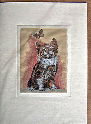 J & J Cash woven card, with no words, but picture of a tabby kitten and a butterfly