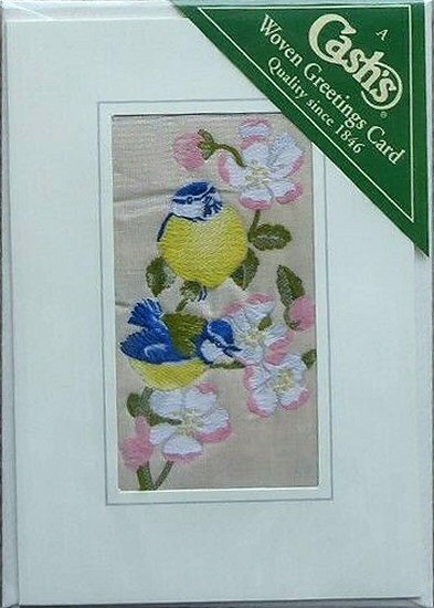 J & J Cash woven card, with no words, but picture of two Blue Tits and blossom