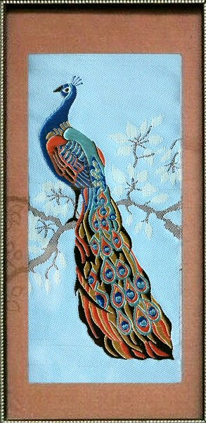 J & J Cash woven picture of a Peacock on a branch