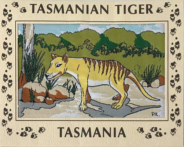 J & J Cash woven card, with title words, and image of the Tasmanian Tiger animal