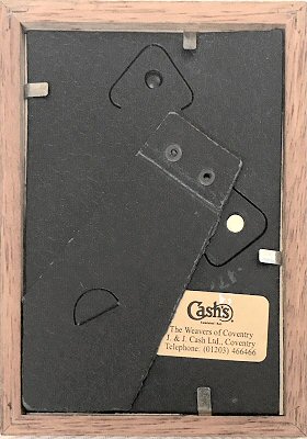 J & J Cash label attached to the rear of this frame