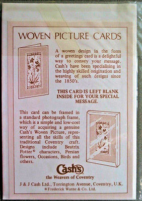 printed words on the additional insert behind this card, confirming it was made by J & J Cash
