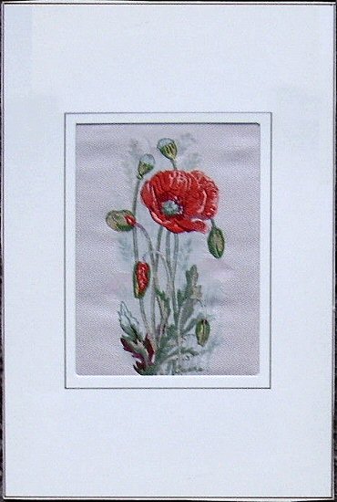 J & J Cash woven flower card, with image of Poppy (single flower with multiple buds)