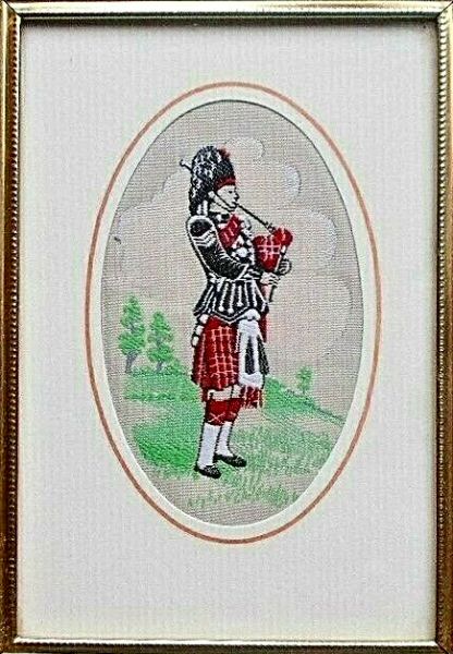 J & J Cash framed woven greetings card, with no title, but image of a Scottish Piper