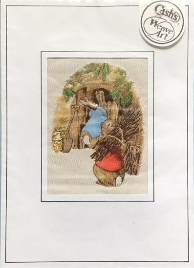 J & J Cash woven card, with no title words, but image of Rabbits carrying firewood