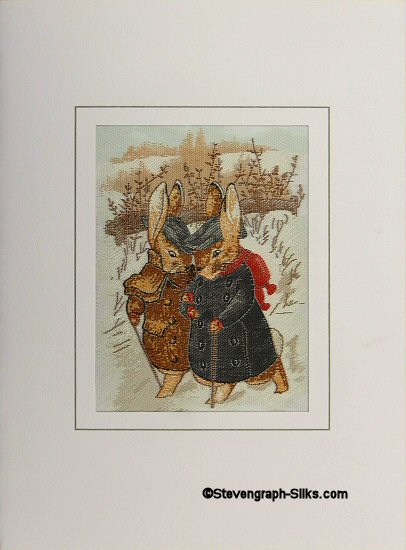 J & J Cash woven card, with no title words, but image of Rabbits walking in snow