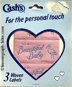 J & J Cash woven saw-on label with words: TO A BEAUTIFUL BABY