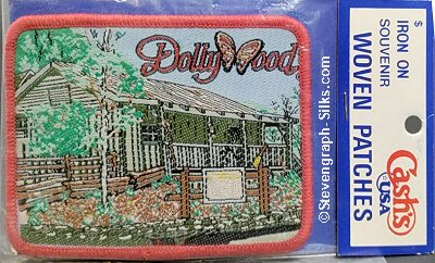 J & J Cash woven saw-on label with words: Dolly Wood