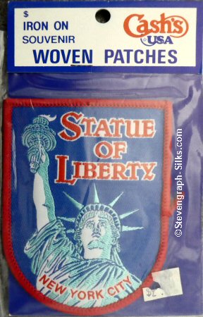 J & J Cash woven saw-on label with words: Statue of Liberty - New York City