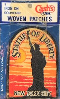 J & J Cash woven saw-on label with words: Statue of Liberty - New York City