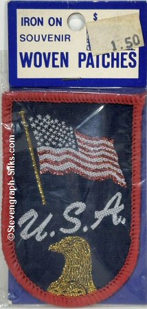 J & J Cash woven saw-on label with words: U.S.A.