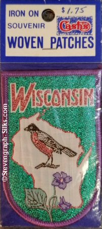 J & J Cash woven saw-on label with words: Wisconsin