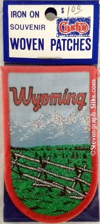J & J Cash woven saw-on label with words: Wyoming