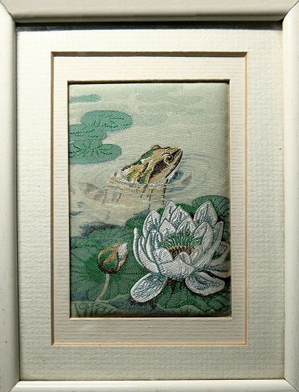J & J Cash woven picture with image of a Frog with a lily flower