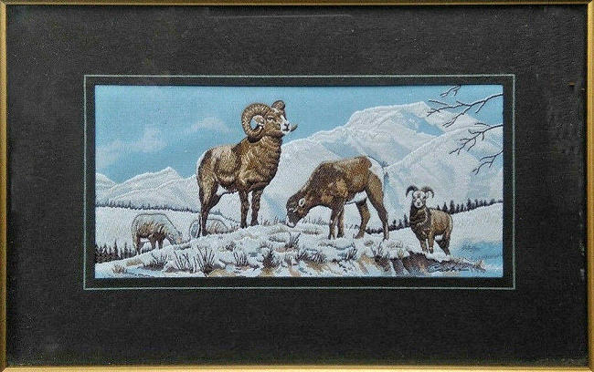 J & J Cash woven picture with image of several Bighorn Mountain Sheep