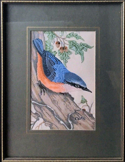 J & J Cash woven picture of a bird, with no words, but image of a Nuthatch, on tree trunk