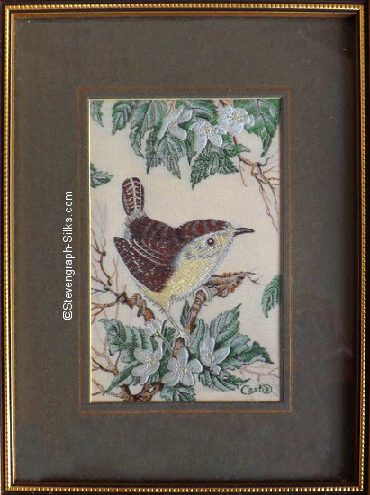 J & J Cash woven picture of a bird, with no words, but image of a wren