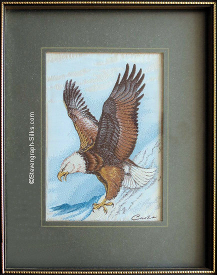 J & J Cash woven picture of a bird, with no words, but image of a Bald Eagle